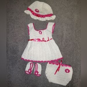 Hand crocheted newborn girl's outfit